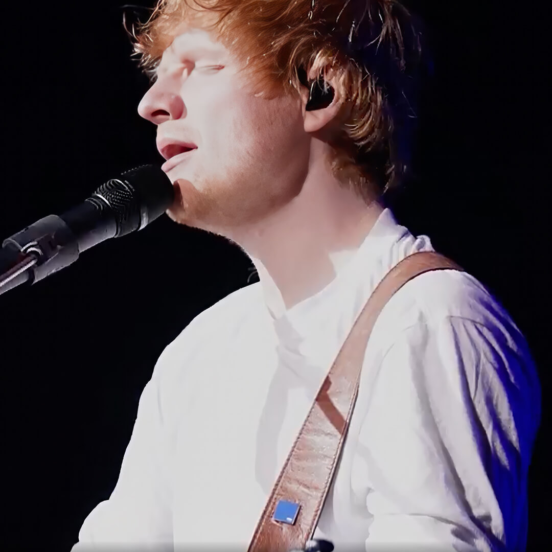 Ed Sheeran wearing a blue square pin in support of the fight against hate.