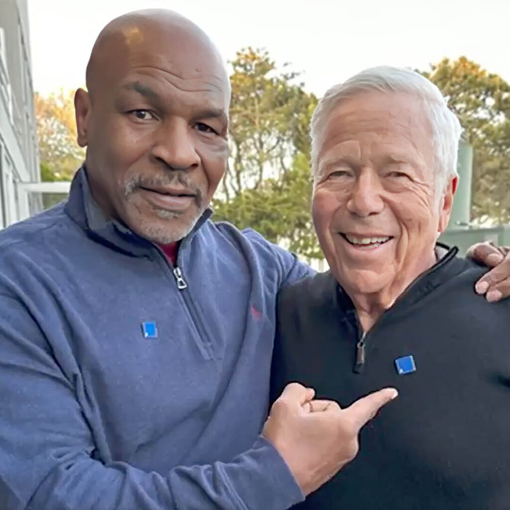 Mike Tyson wearing a blue square pin in support of the fight against hate.