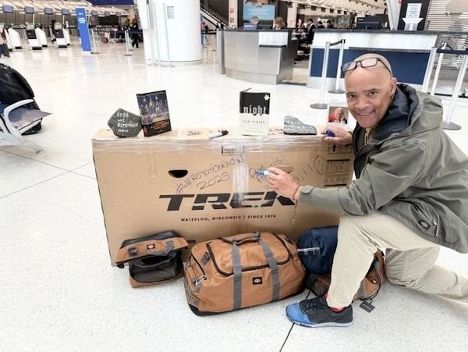 Victor Mooney at the airport to go on his trip to bike across Poland for the We Remember Challenge 