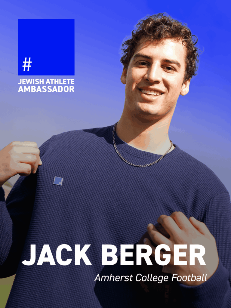 Jack Berger, Amherst College football player, smiling outdoors and displaying a blue square pin, identified as a Jewish Athlete Ambassador.