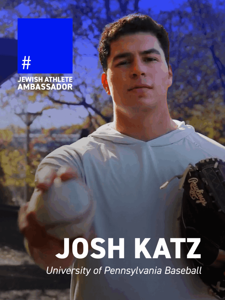 Josh Katz, University of Pennsylvania baseball player, holding a baseball toward the camera, identified as a Jewish Athlete Ambassador.