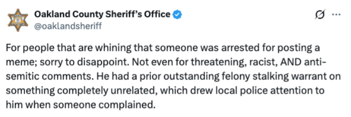 Antisemitic meme displayed at Sheriff Bouchard's press conference Screenshot from a March 19, 2026 press conference held by Oakland County Sheriff Mike Bouchard, showing an antisemitic meme projected on screen depicting Bouchard's face digitally altered to include a Star of David on his forehead and payot near his ears. The meme was created to harass Bouchard following his coordination of the law enforcement response to the March 12, 2026 vehicle-ramming attack on Temple Israel in West Bloomfield, Michigan.