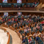 The congregation stands during the Stand Up Sunday service at St. Luke’s Methodist Church in Oklahoma City.